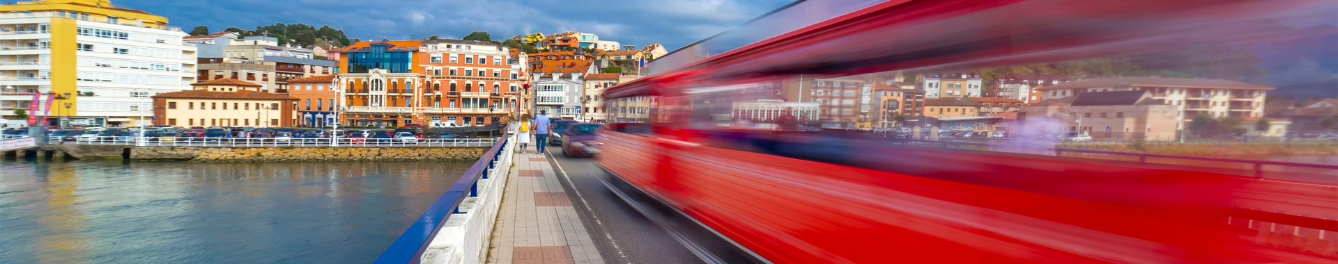 A bullet train races toward a city