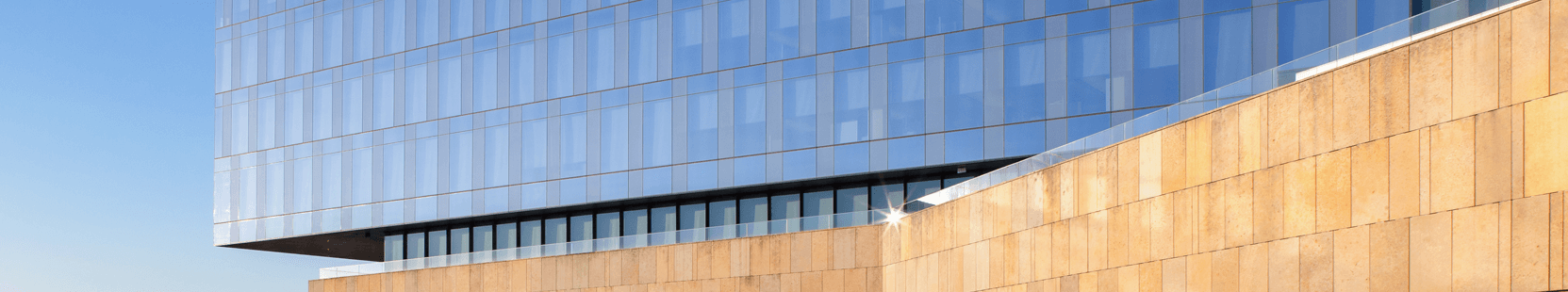 View of a glass wall from RGA World Headquarters reflects stability and vision