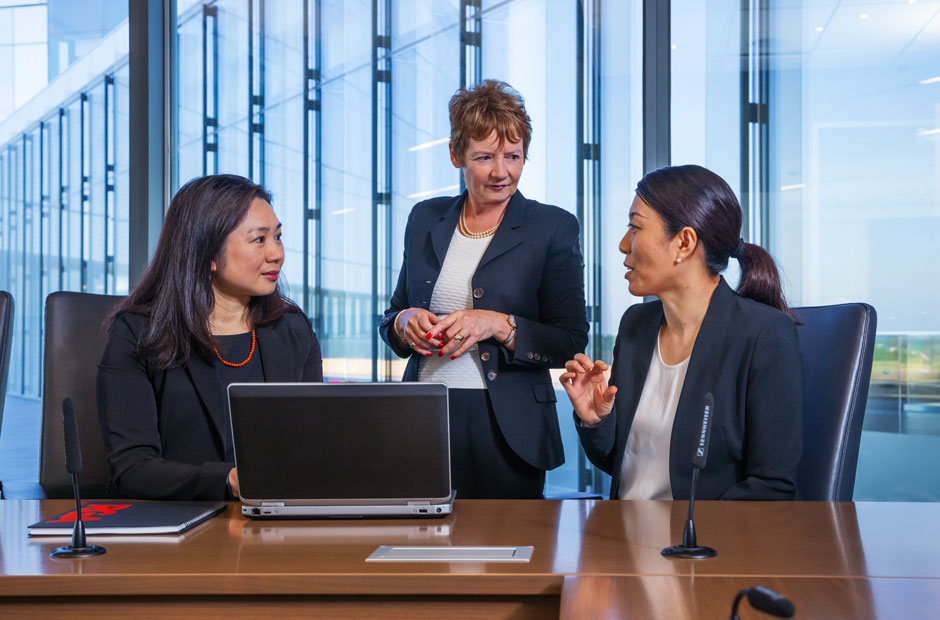 Senior members of the global claims team meet to discuss living benefits