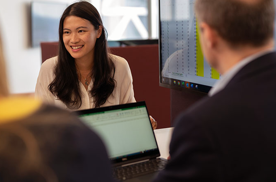 Smiling woman in a meeting in London