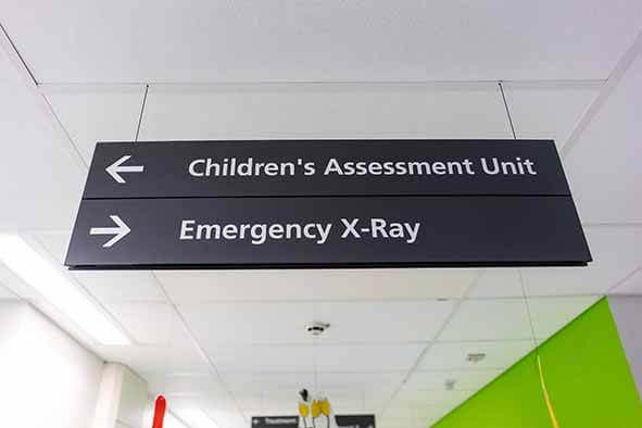 Sign for children's assessment unit in hospital