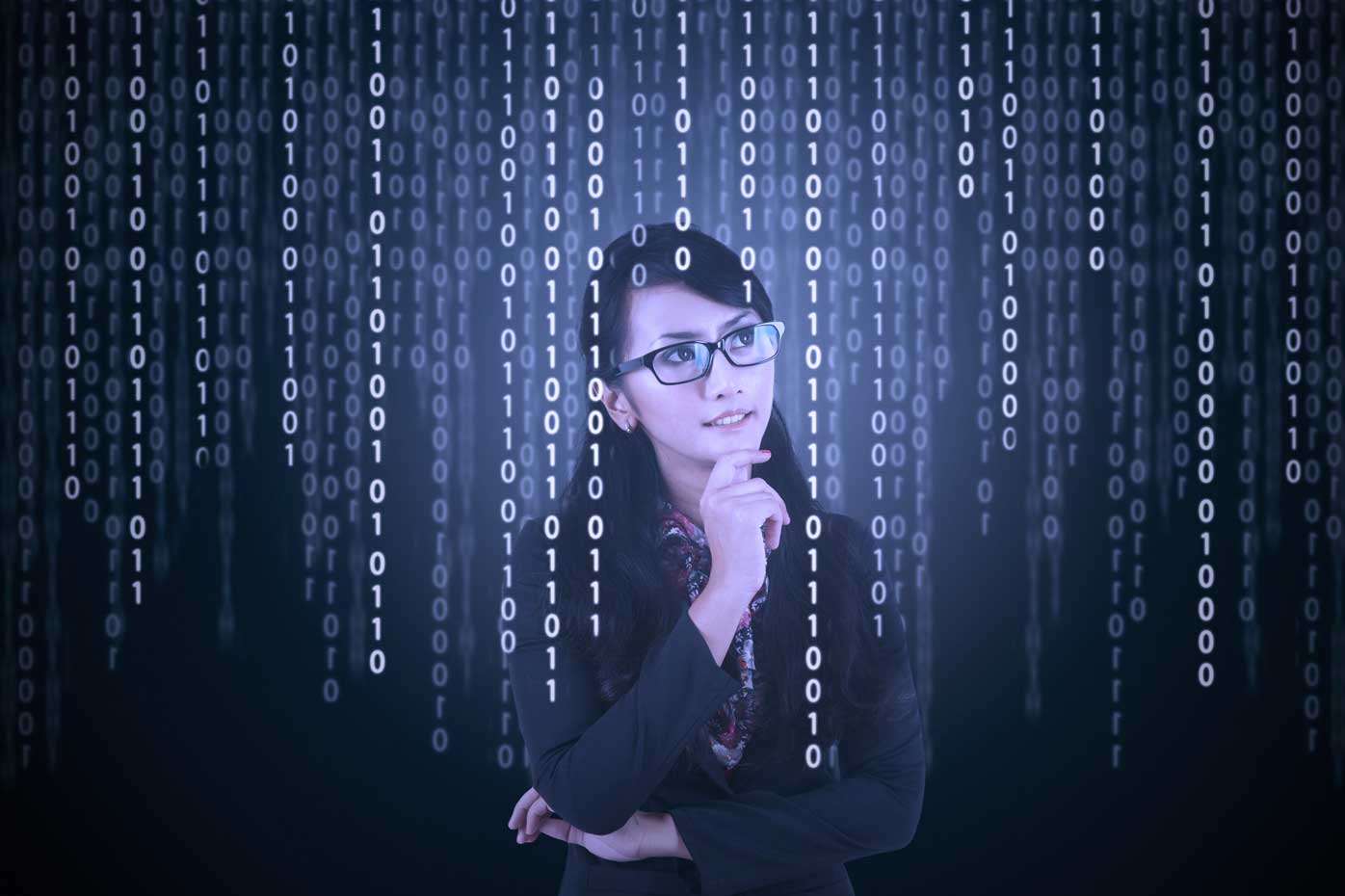 Woman viewing binary code