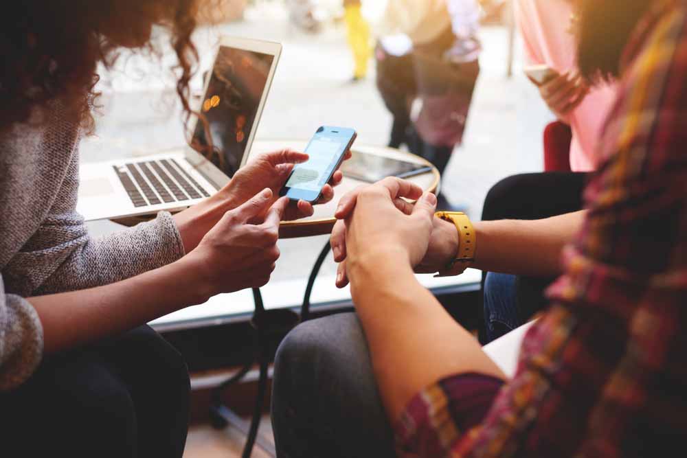 Woman and man operate smartphone apps