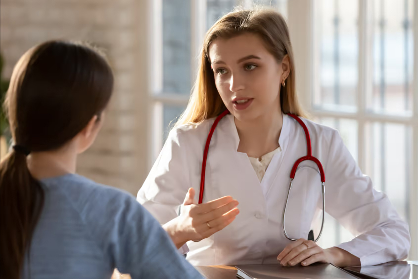 Doctor explaining results to woman