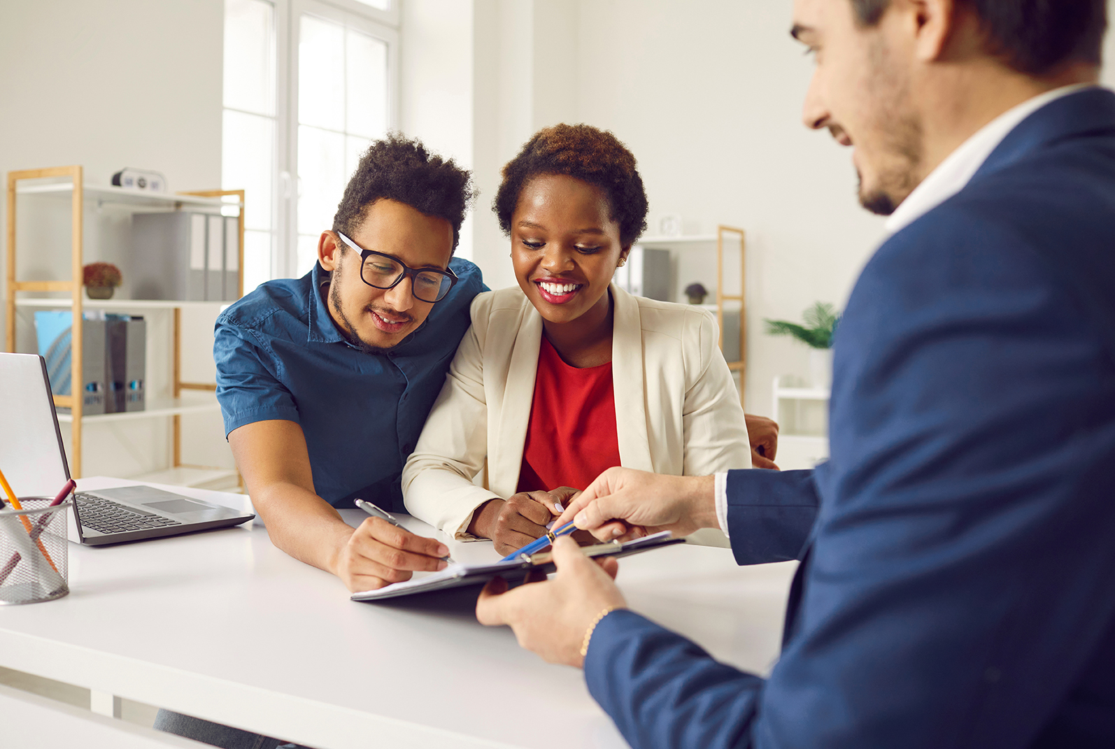 Diverse couple with advisor